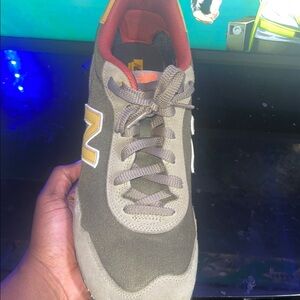 New Balance Men's Black and Gold Sneakers